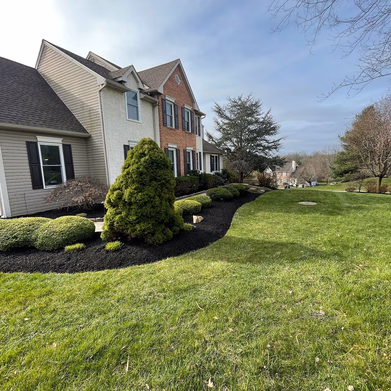 Front yard landscape transformation by Long Meadow Lawn and Landscape