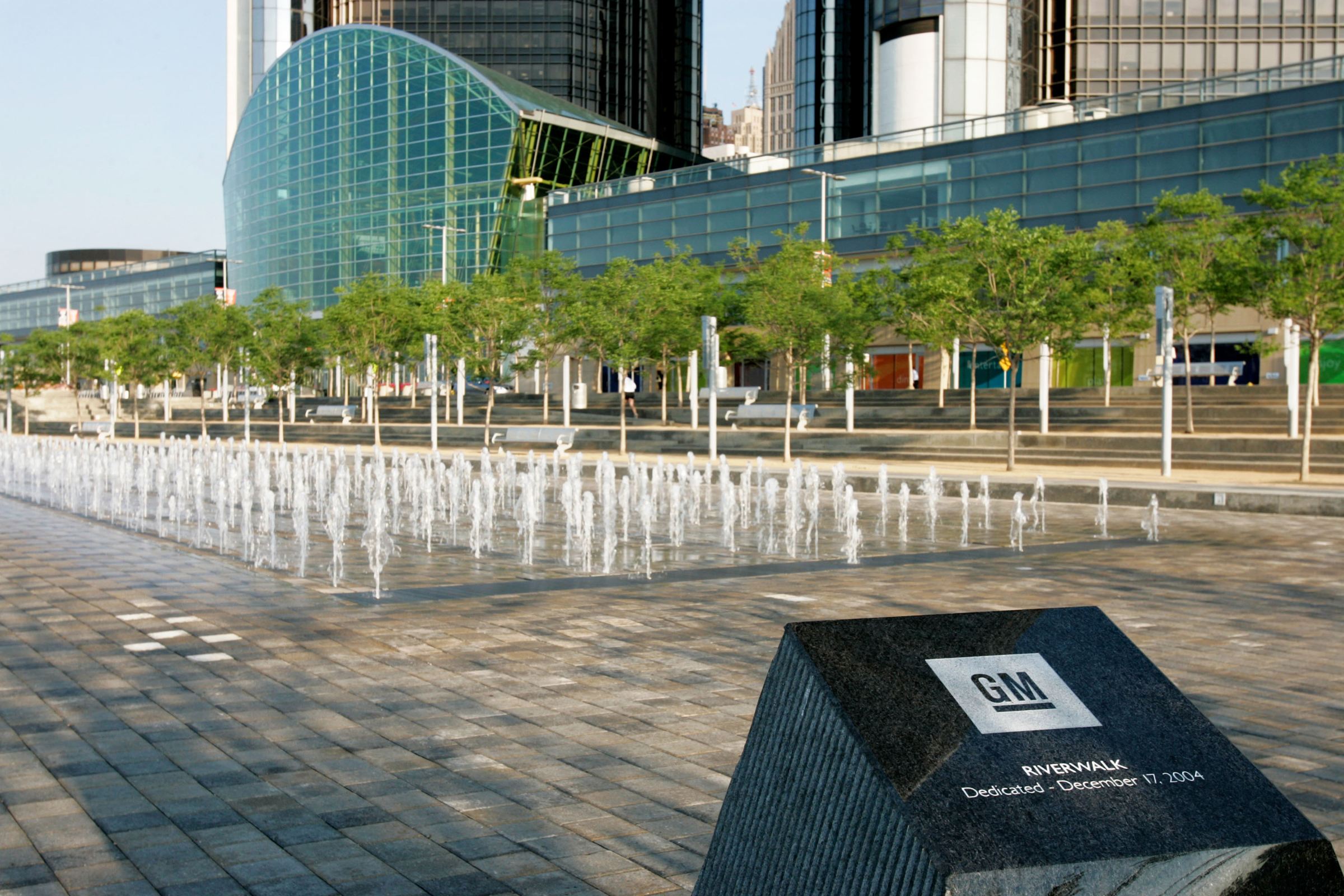 Exterior photo of Cullen Plaza at the Renaissance Center, featuring a dedication plaque by GM.
