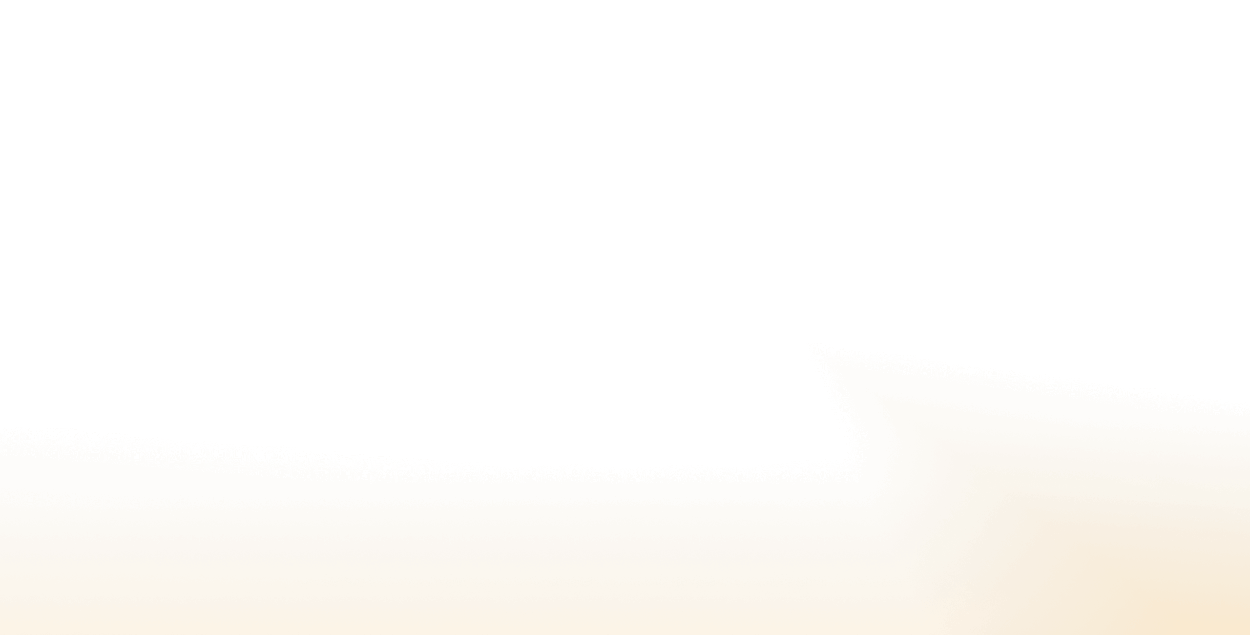 Row of hanging yellow-orange paper lanterns glowing against a dark night sky.