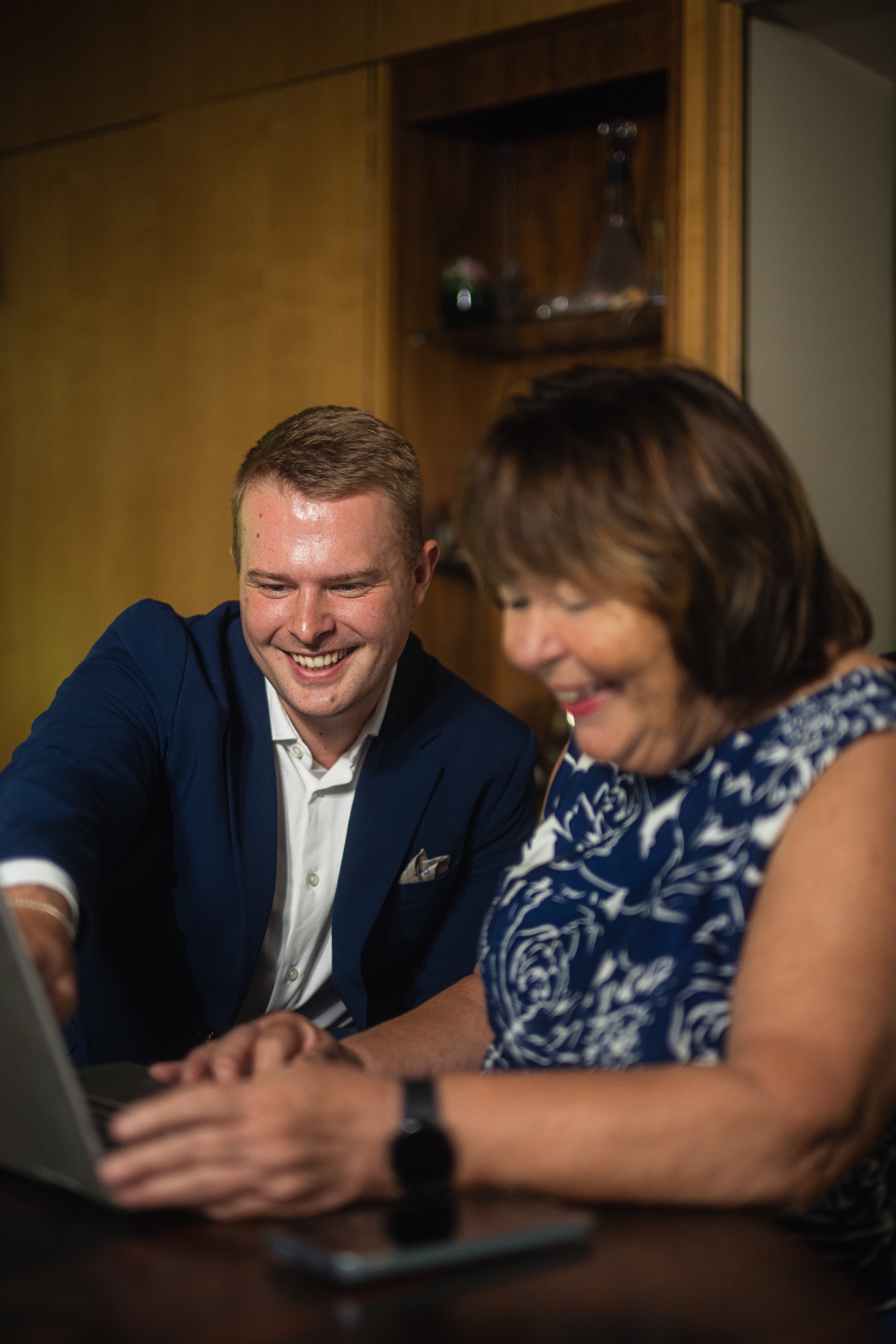 Ann-Cristine Westerlund and Nicholas Mavrostomos of Westmusa tax and accounting services company working together in a conference room.