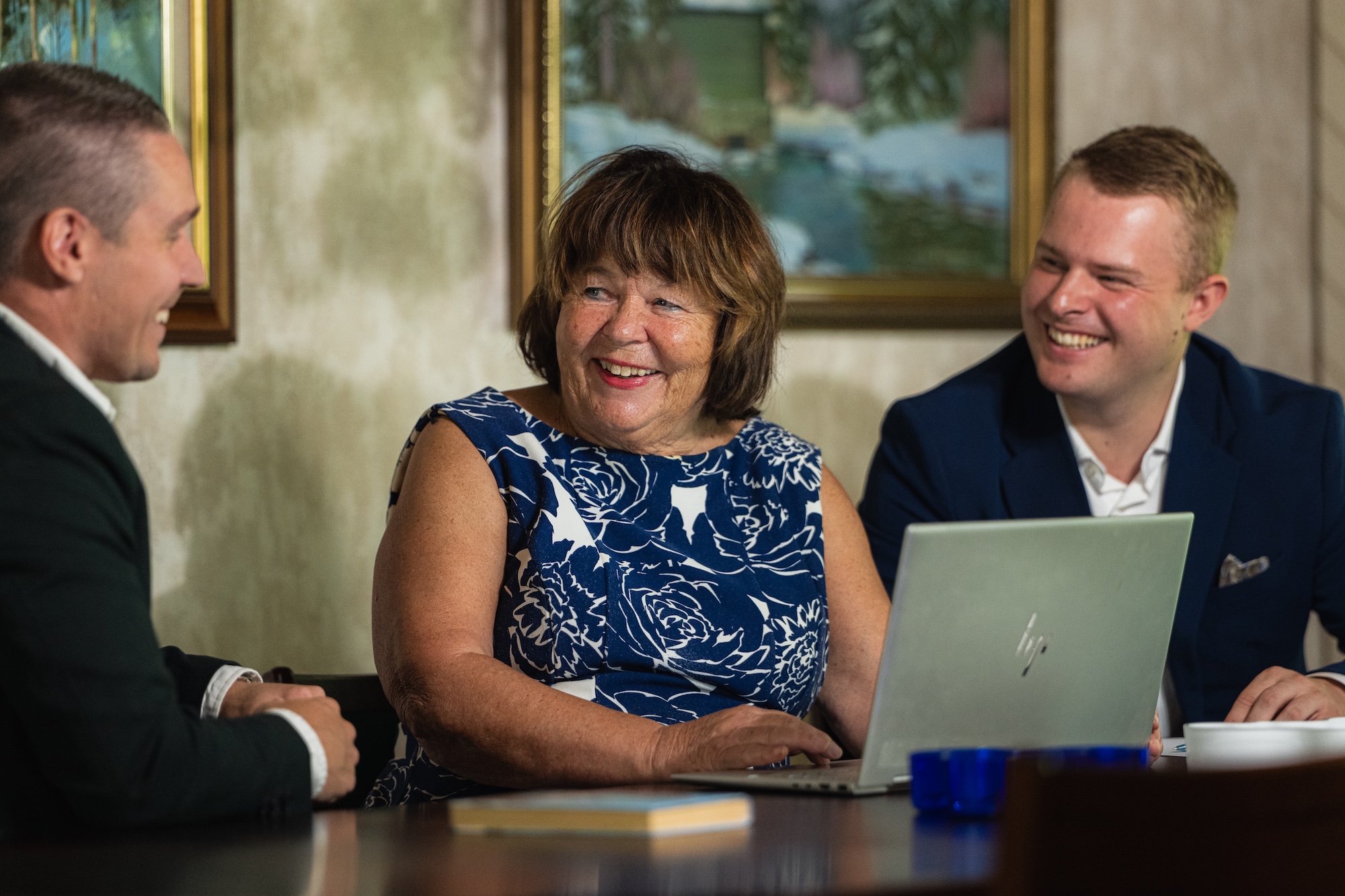 The Westmusa tax and accounting team working together and smiling.