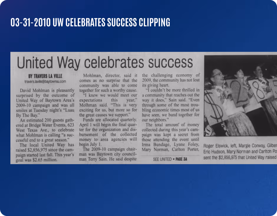 Newspaper clipping titled 'United Way celebrates success' describing the 2009-10 campaign outcome with a photo of people holding large dollar signs and the number 18.