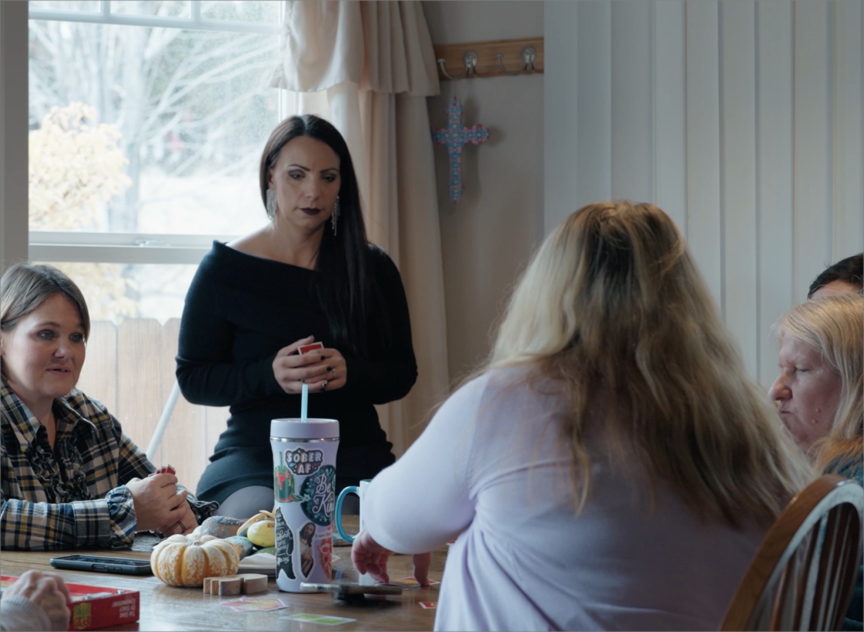 Women around a table sharing and listening