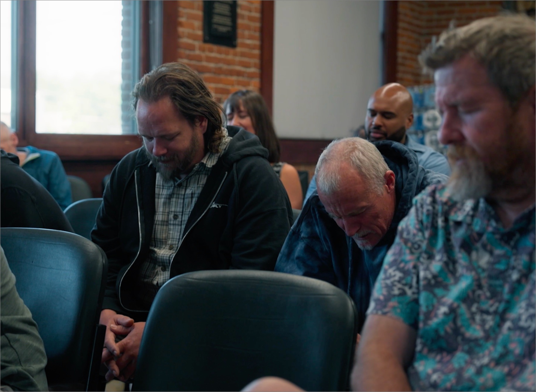 Men praying together