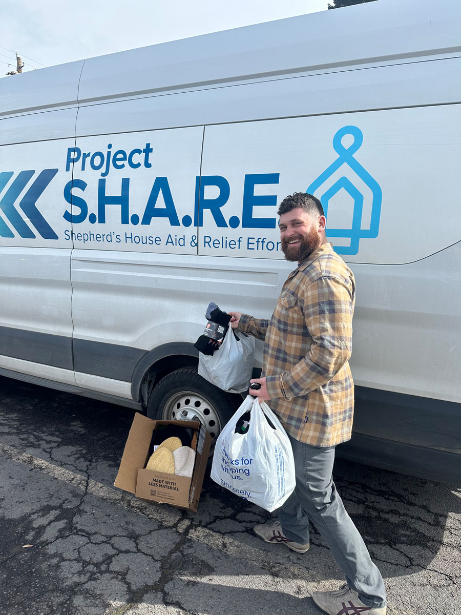 Volunteer outside SHARE Van