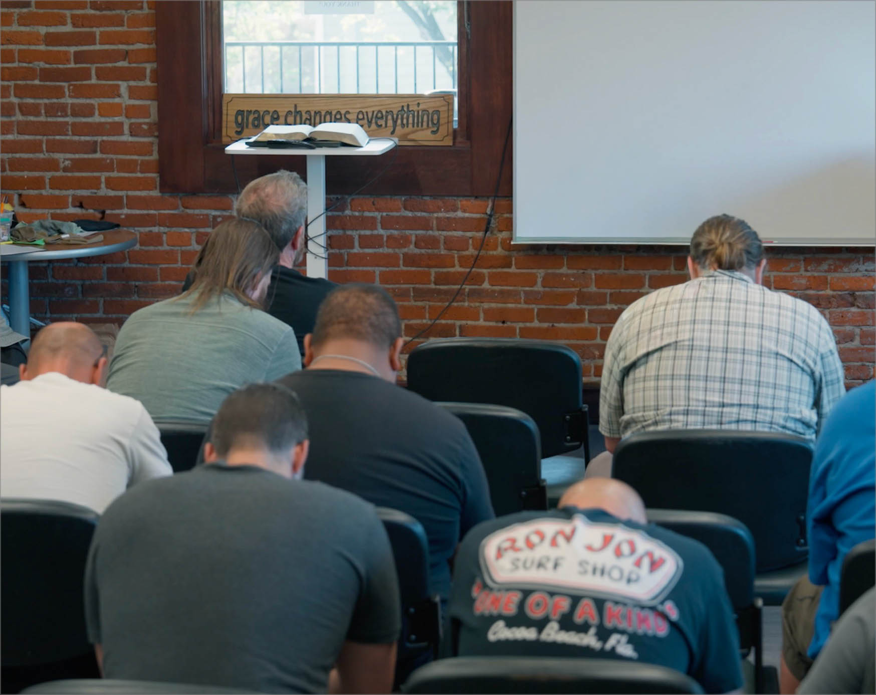 Men praying together