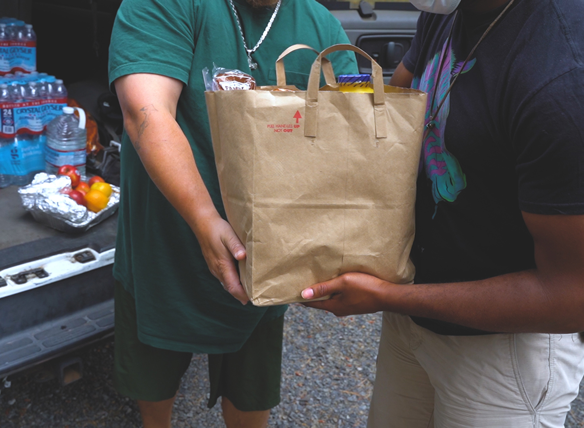 SHARE Van dropping off goods to those in need