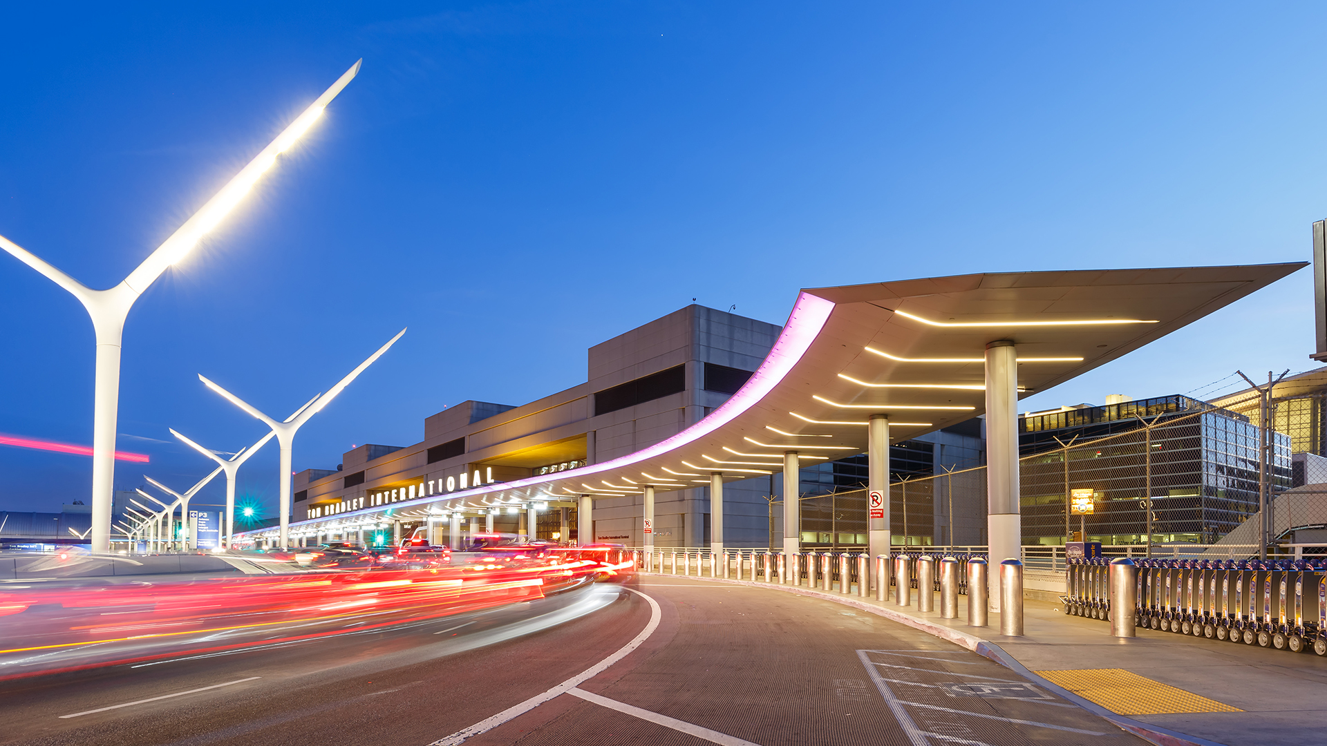 [background image] image of downtown area with transit signage (for a public transportation company)