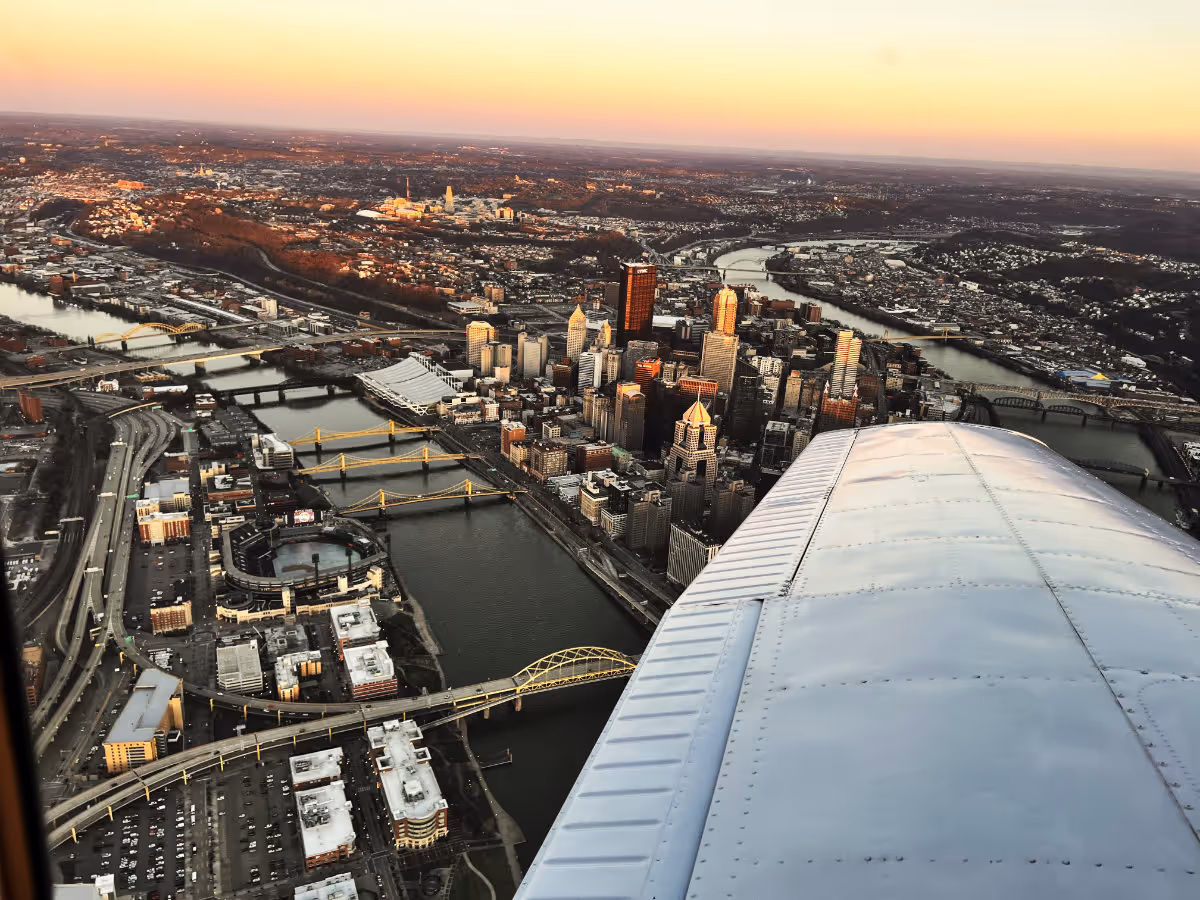 AirQuest city tour scenic flight — aerial view of the city skyline