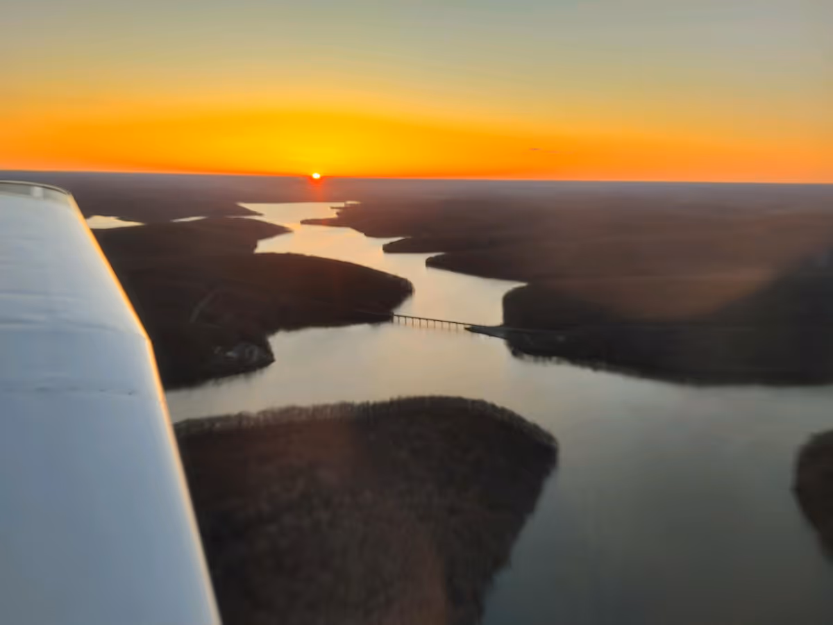 AirQuest country tour scenic flight — aerial view of rolling countryside and farmlands
