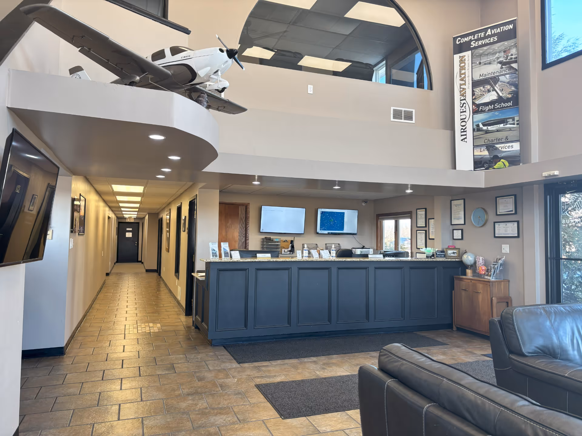 AirQuest FBO hero — full-service fixed base operator terminal and ramp area