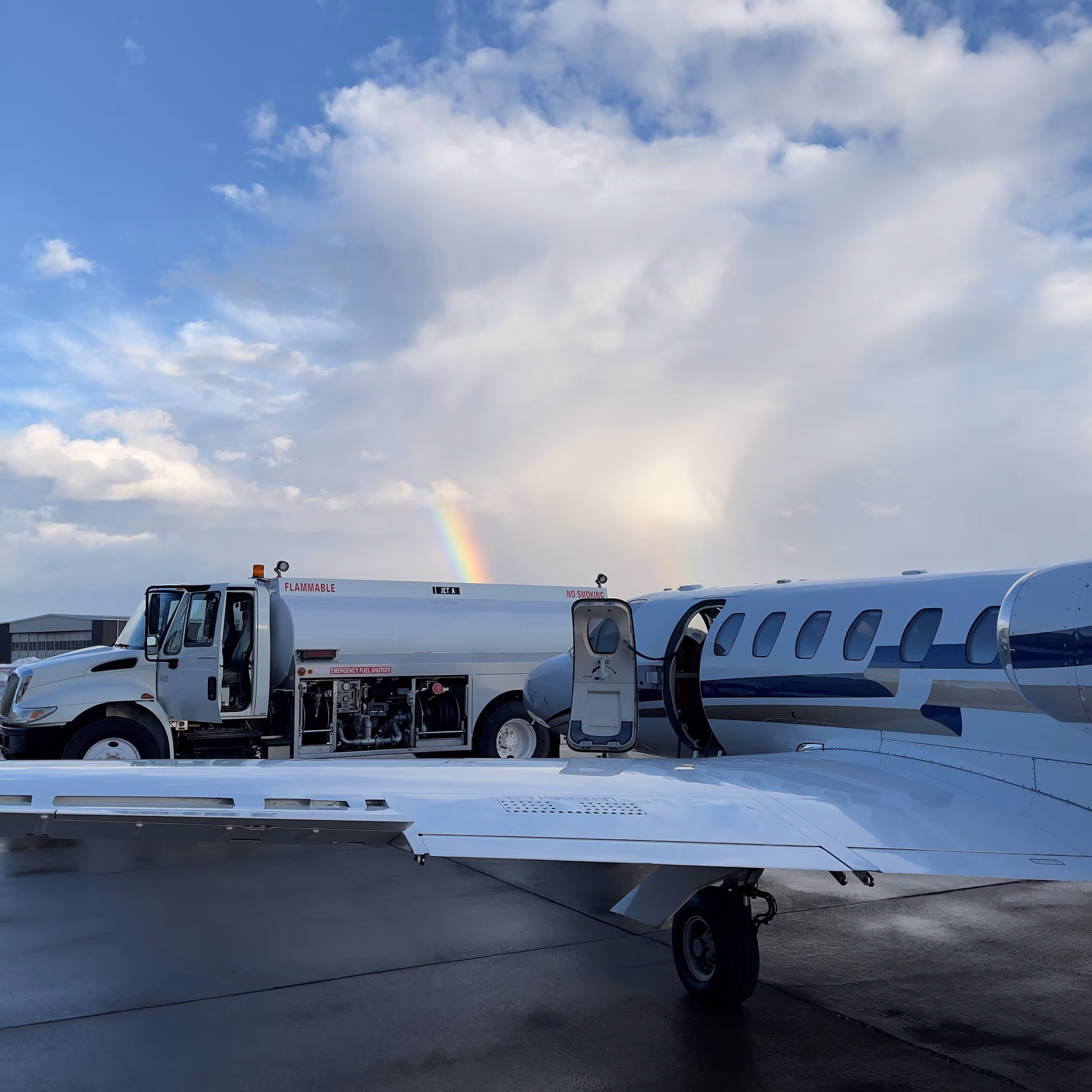 AirQuest FBO fueling — aircraft being fueled on the ramp by ground crew