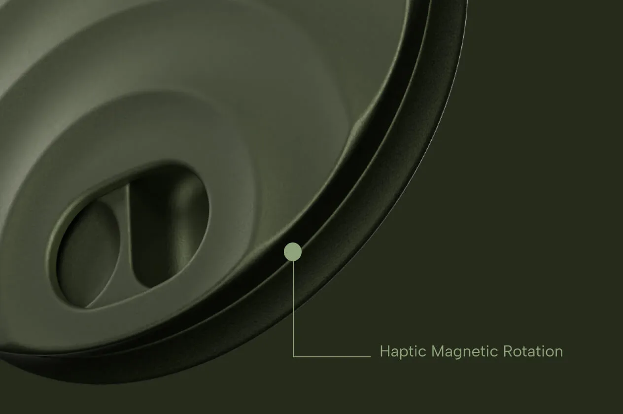 Close-up of a device part labeled 'Haptic Magnetic Rotation' with a green dot indicator.