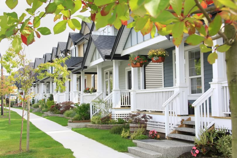 Tree-lined neighborhood with welcoming front porches and landscaped homes