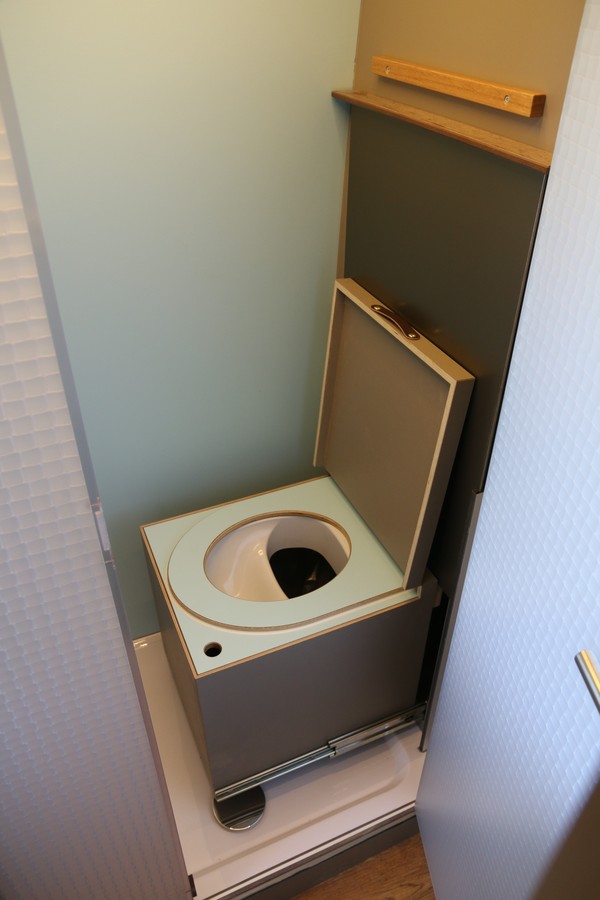 a view of the toiled inside the bathroom module