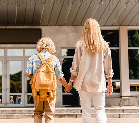 mum and child entering school