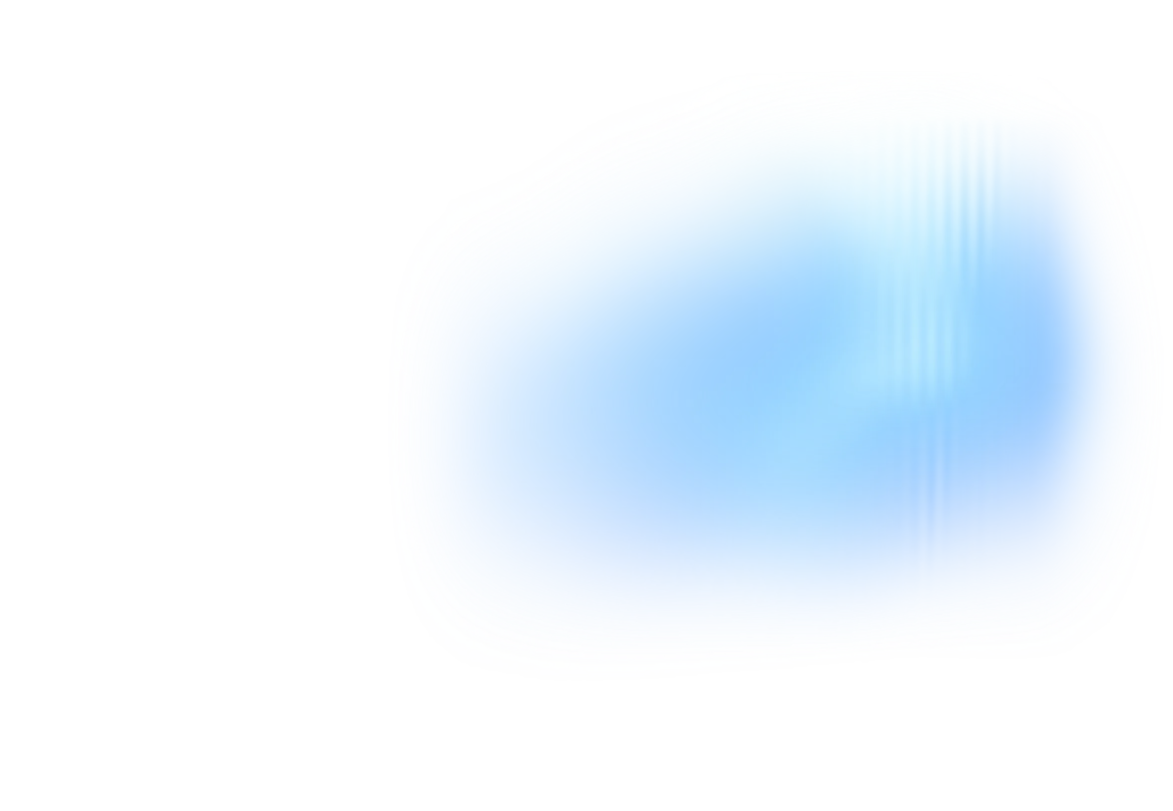 Mountain peak illuminated by golden sunlight against a blue sky with some clouds.