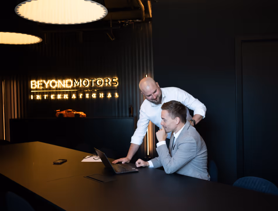 Beyond Motors International team discussing European B2B car trading strategy