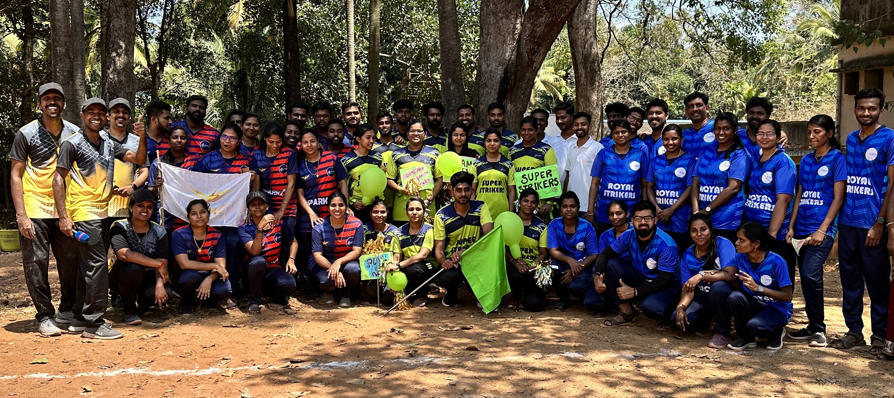 A grayscale image of a team working at a table, featuring rounded corners for a modern UI look.