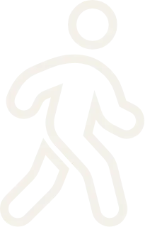 Pixelated icon of a person walking.
