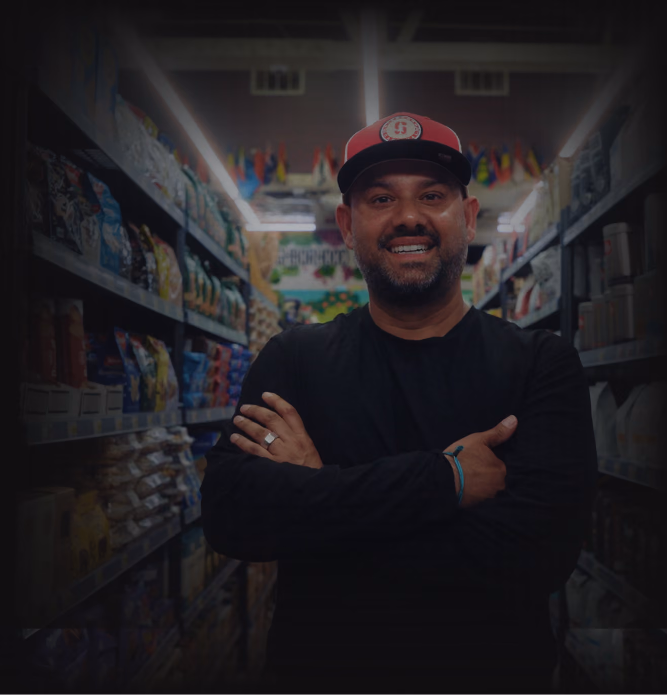 Tre, Vori's Chief Product Officer, smiling in a grocery store aisle