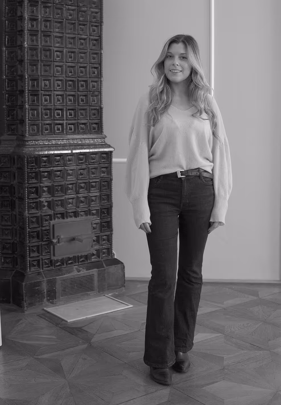 Isabelle Weinmann standing in front of a chimney