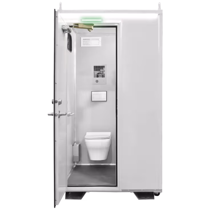 White compact restroom unit with a glass door showing a wall-mounted toilet inside.