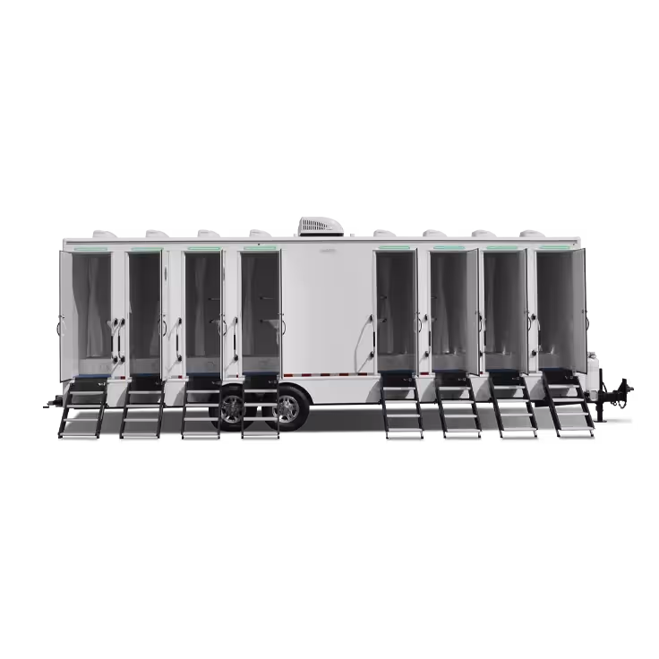 White mobile trailer with eight individual restroom doors and stairs for each entrance.