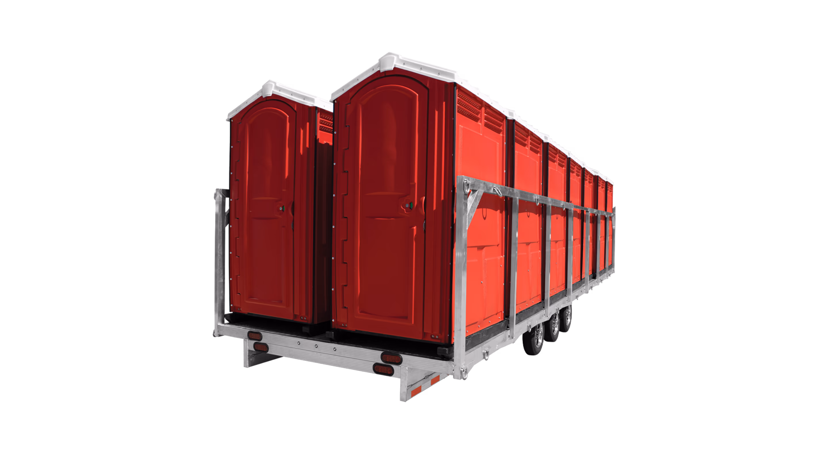 Red portable toilets mounted on a triple-axle trailer frame for transport.
