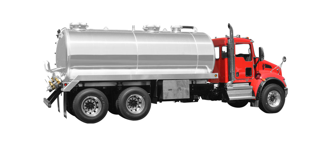 Red tanker truck with large silver cylindrical tank on its back isolated on white background.