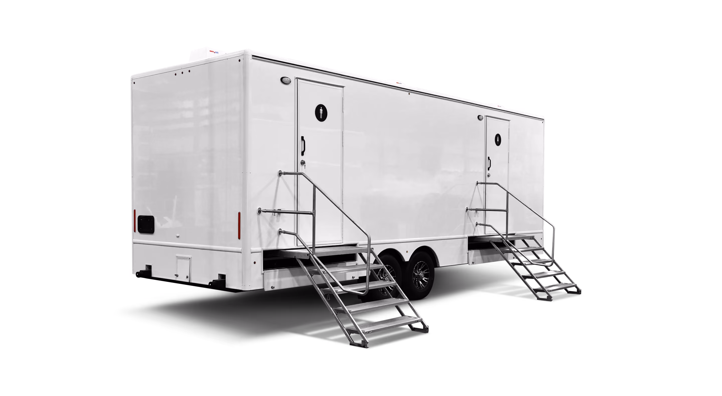 A large white trailer with two sets of stairs, featuring doors on both sides.