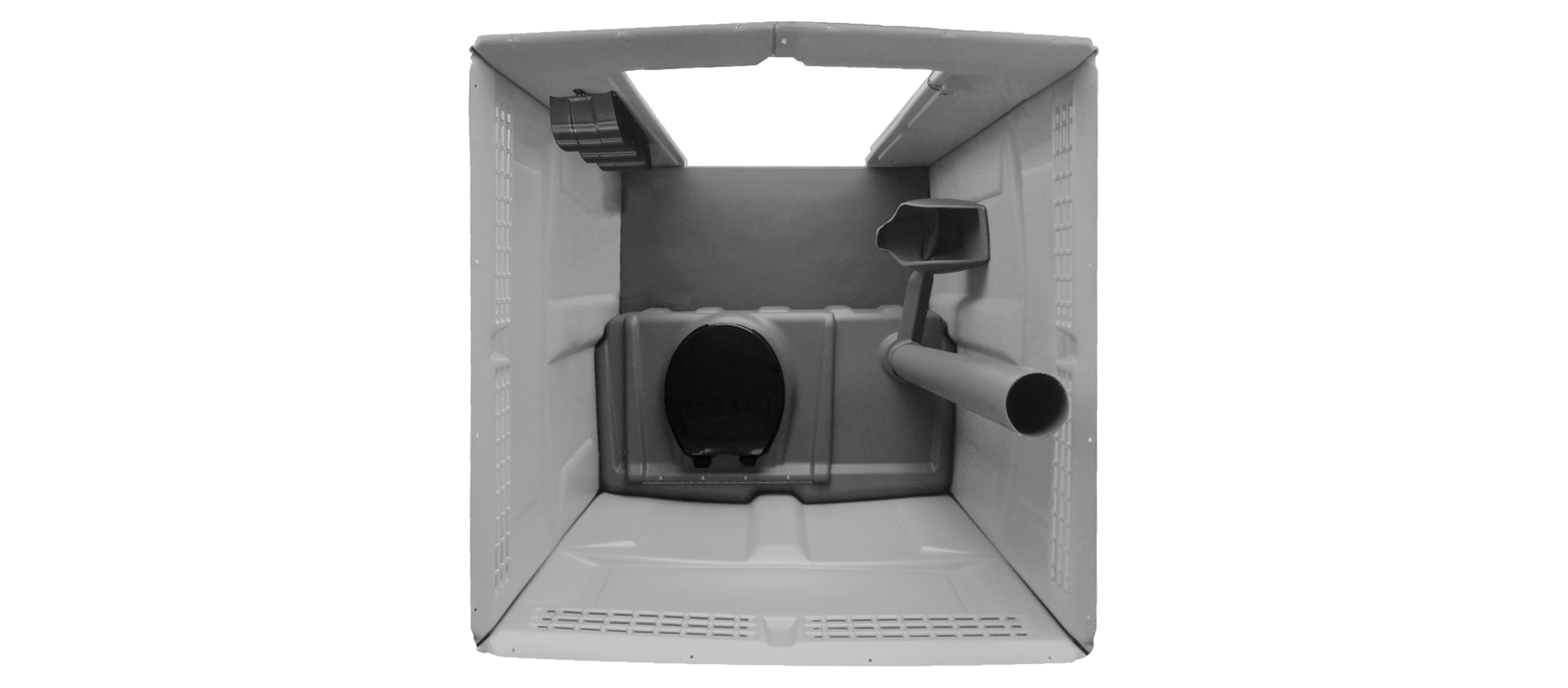 Interior view of a portable plastic outdoor toilet with toilet seat and waste pipe.
