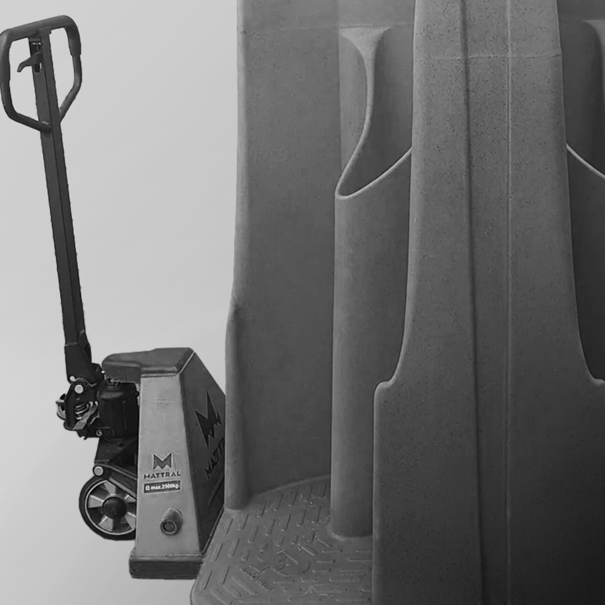 Forklift and pump truck ready equipment with a pallet jack on a textured surface.
