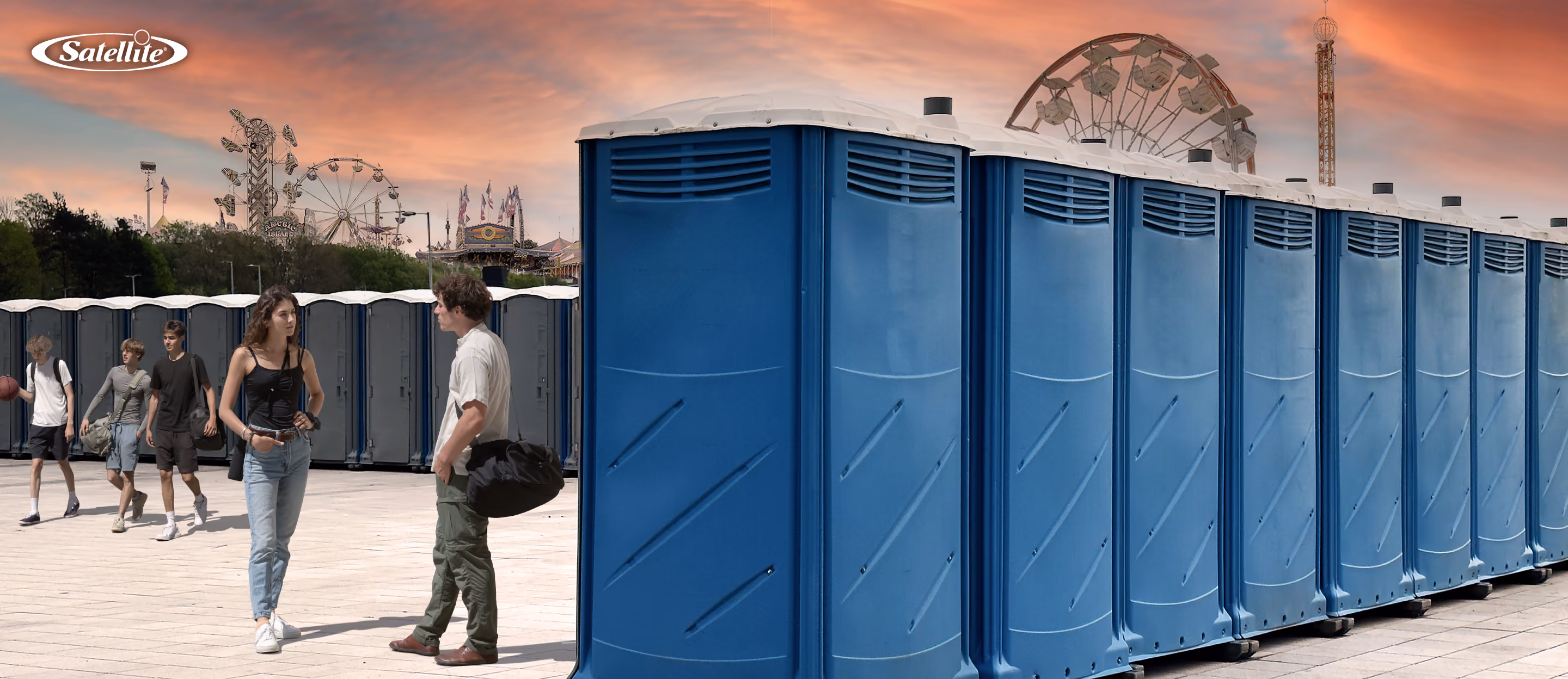 Rows of blue portable restrooms installed at a large outdoor festival with carnival rides and event attendees in the background. The image represents special event portable sanitation planning, helping operators calculate portable restroom rental costs, estimate servicing expenses, and price sanitation services for concerts, festivals, fairs, weddings, and large public events.
