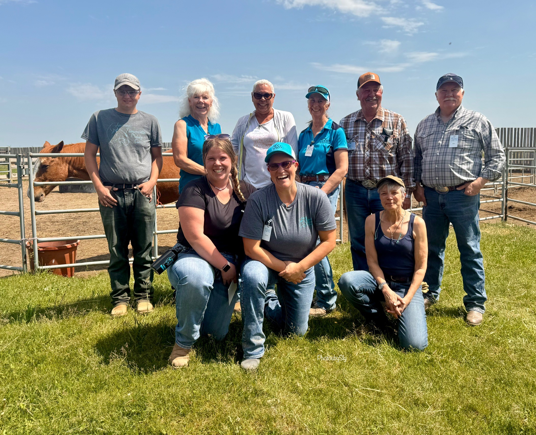 image of volunteers with animals