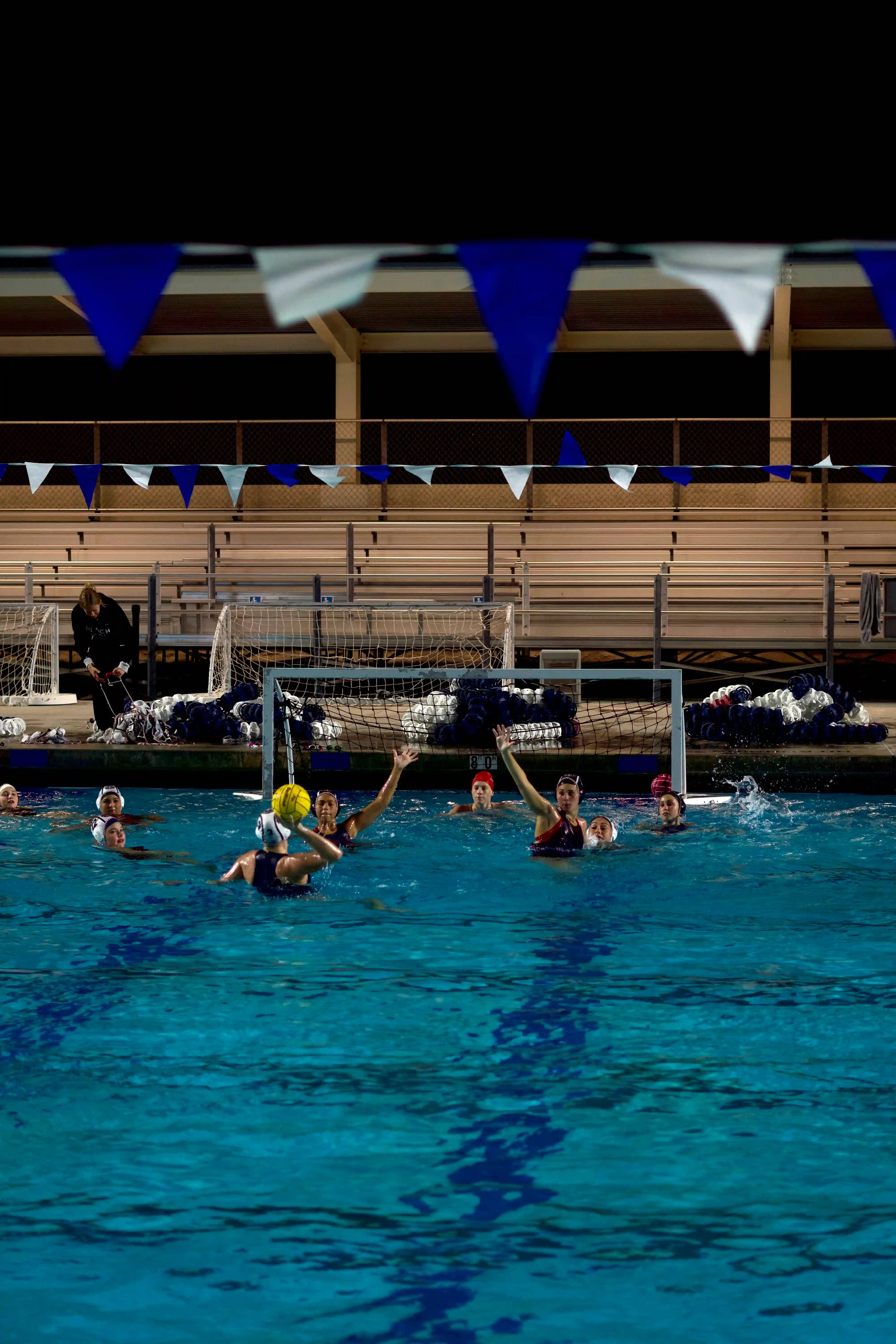 Girls playing water polo.