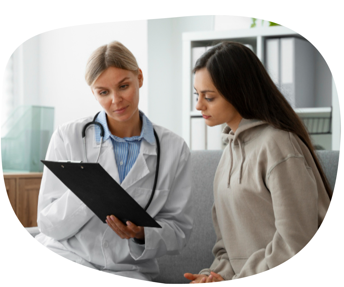 Physician answering an adult patient's questions during a primary care visit in Dallas, TX