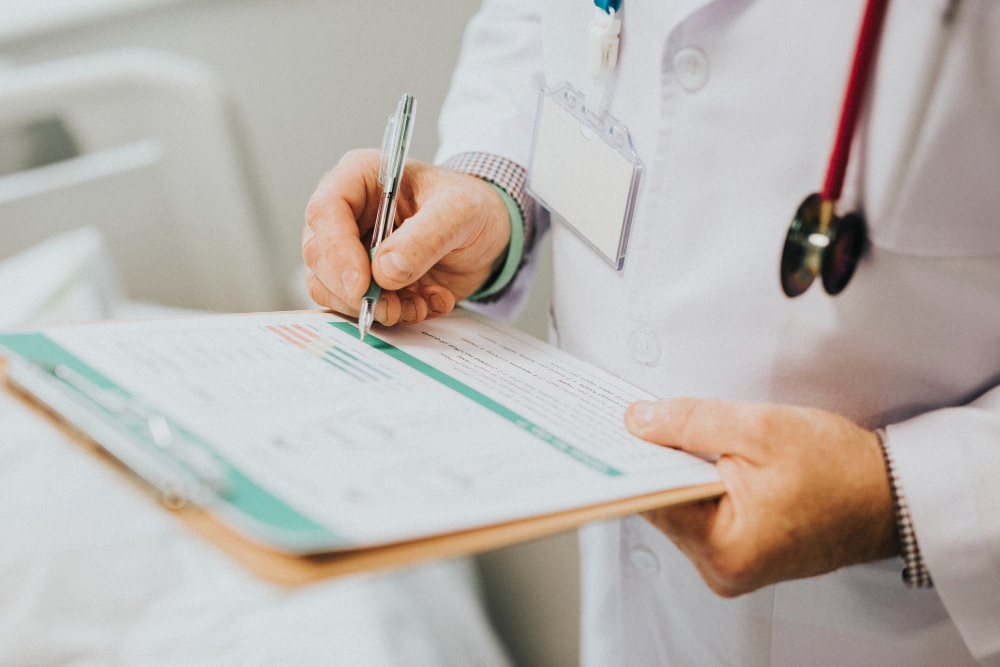 Southwest Dallas primary care doctor assigning clear follow-up responsibilities across providers