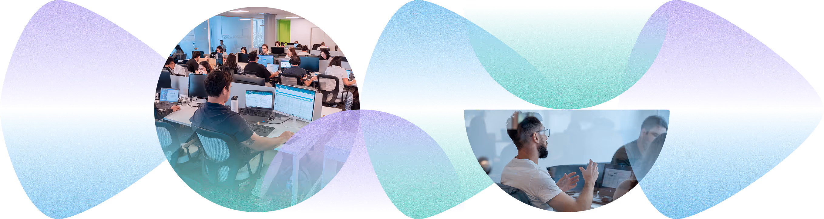 Office scene with employees working at computers and a man gesturing during a meeting.