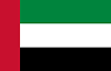 Flag with a vertical red stripe on the left and three horizontal stripes in green, white, and black.