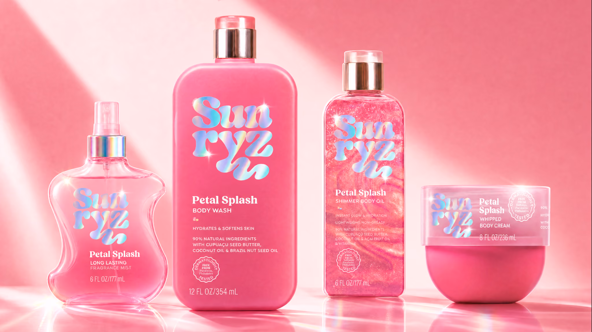 Four pink Sunryz Petal Splash skincare products including fragrance mist, body wash, shimmer body oil, and whipped body cream arranged by a pool.