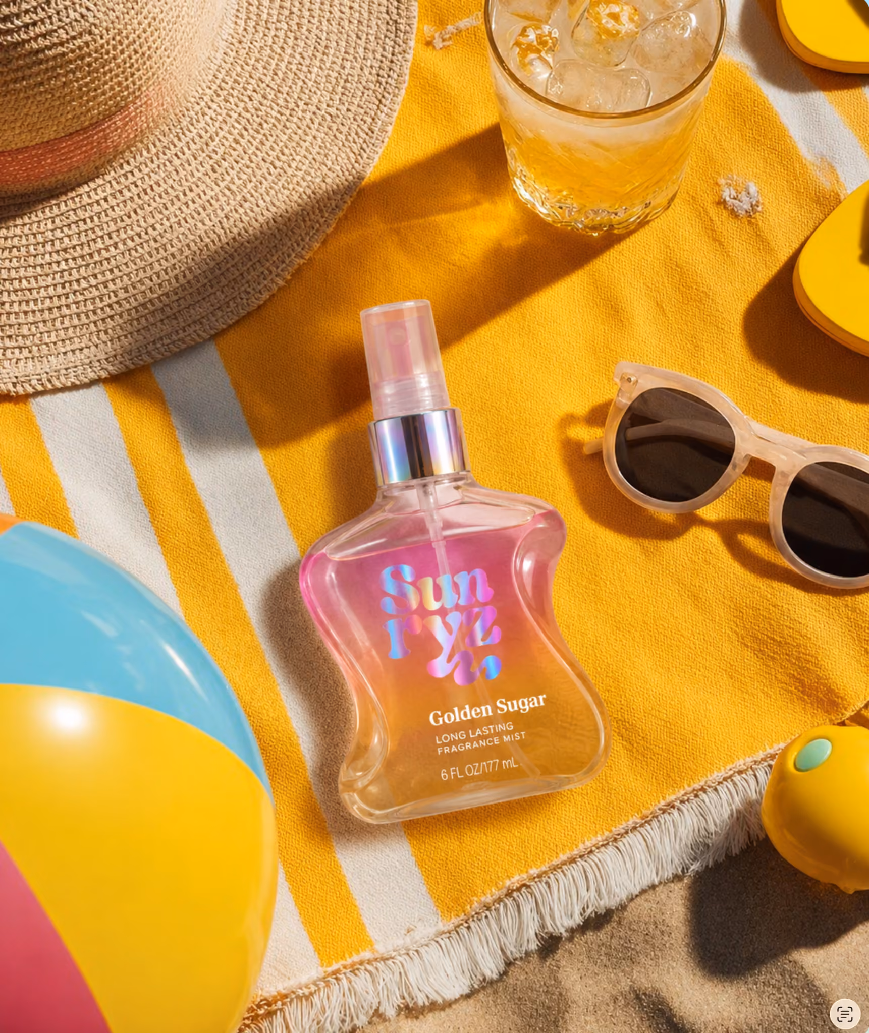 Various colorful perfume and cosmetic bottles placed on papers with color swatches and charts on a black surface.