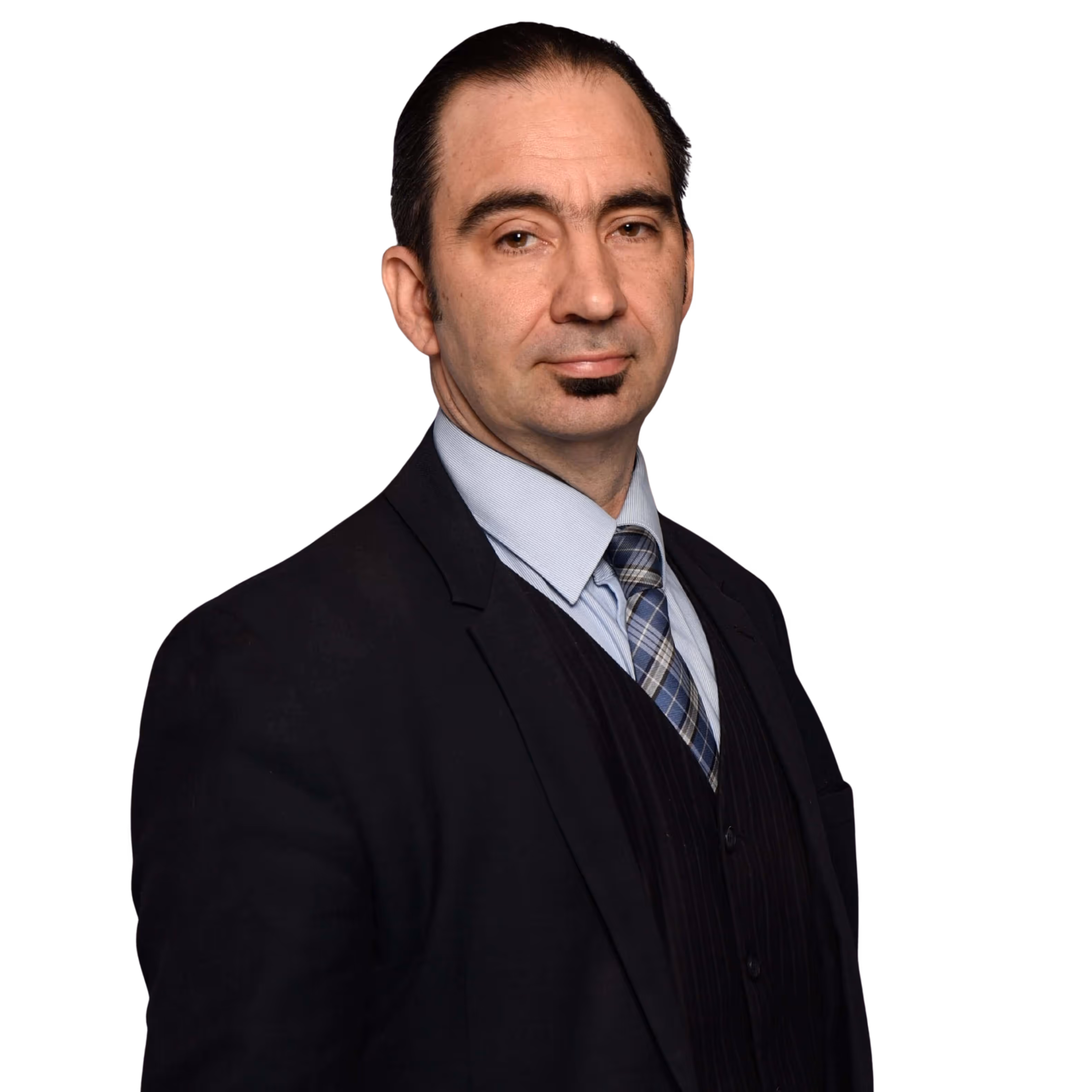 Rechtsanwalt Weidner im Porträt, lächelnd, aufgelehnt auf einem Bürostuhl