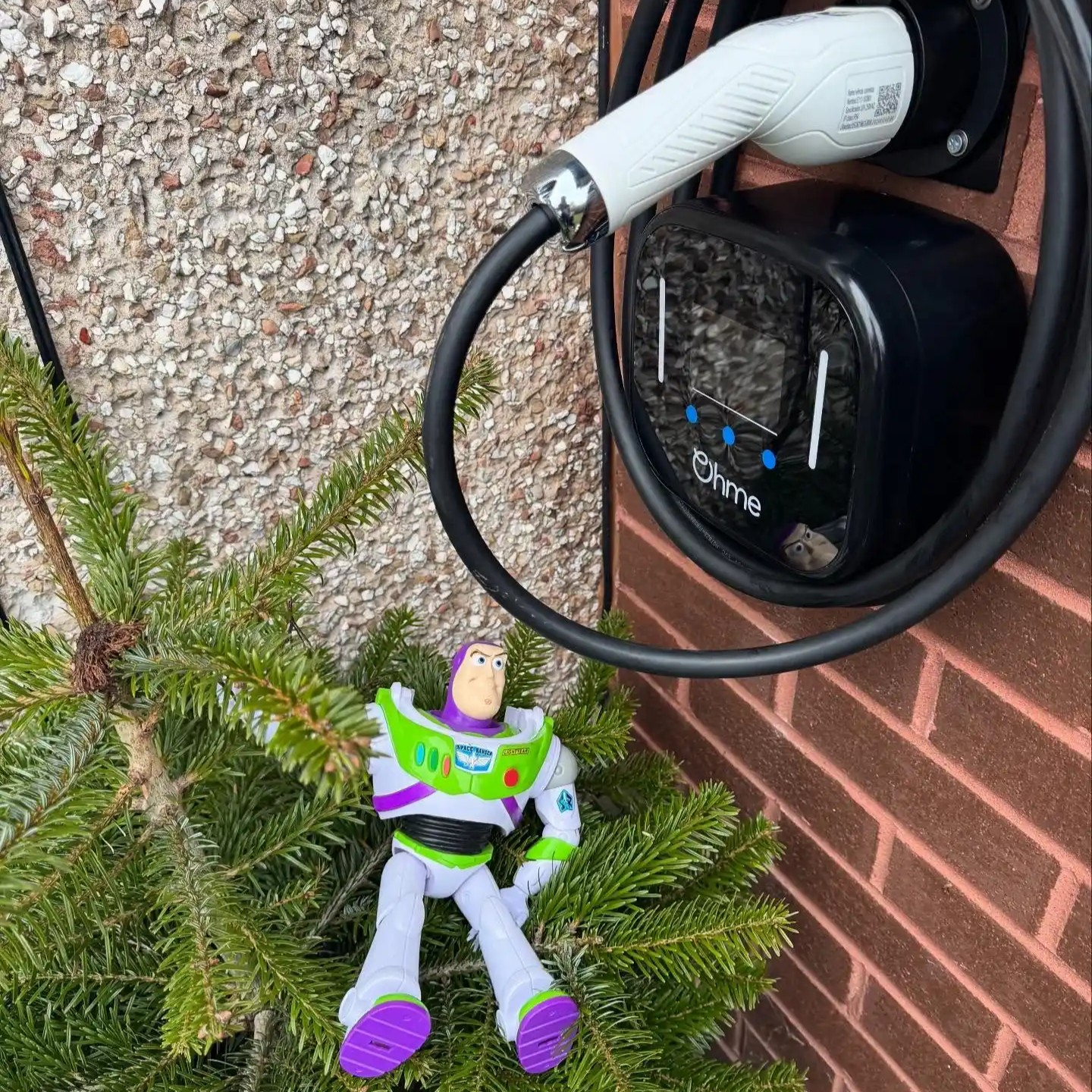 side view of a ohme ev charger installation