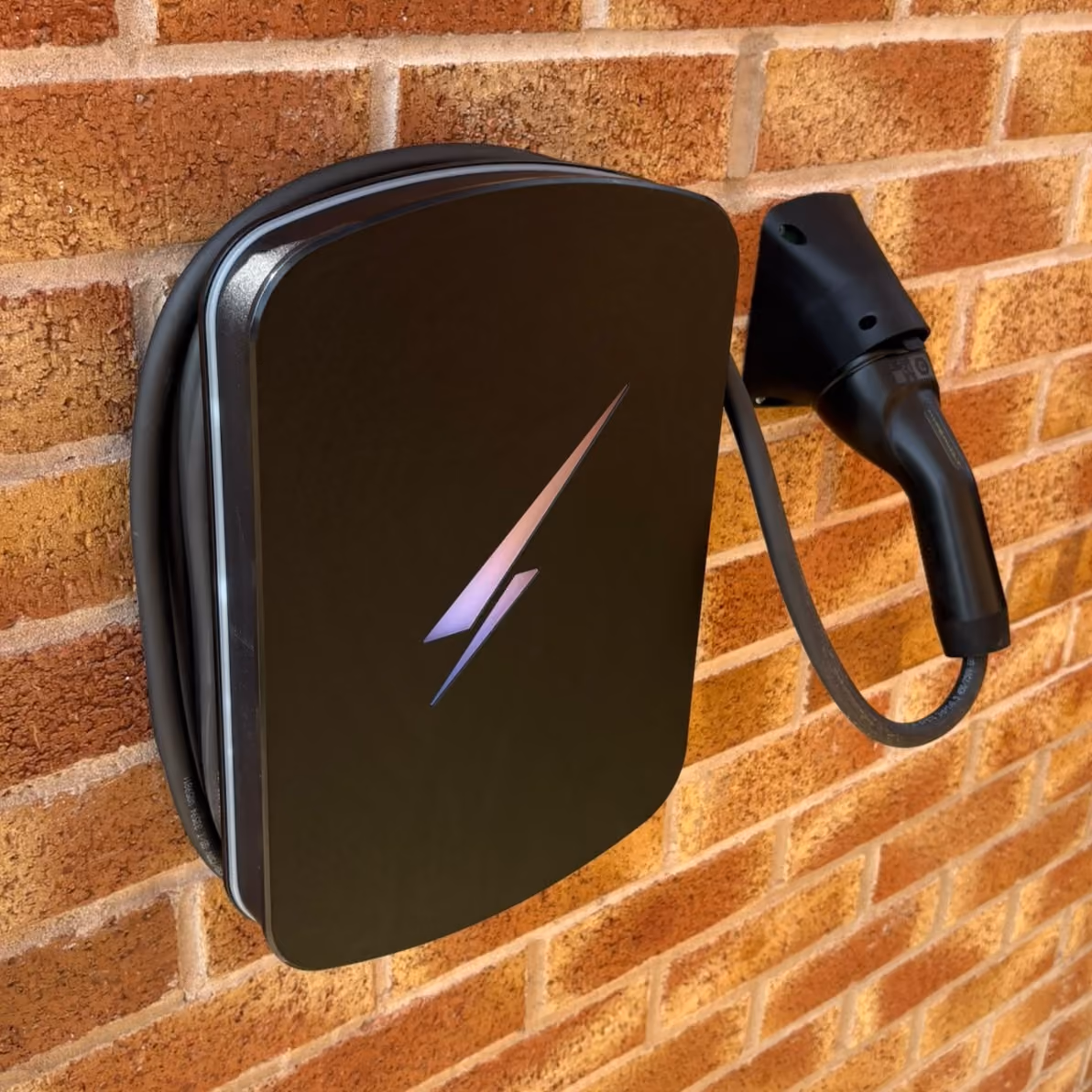 ohme home ev charger installed under light