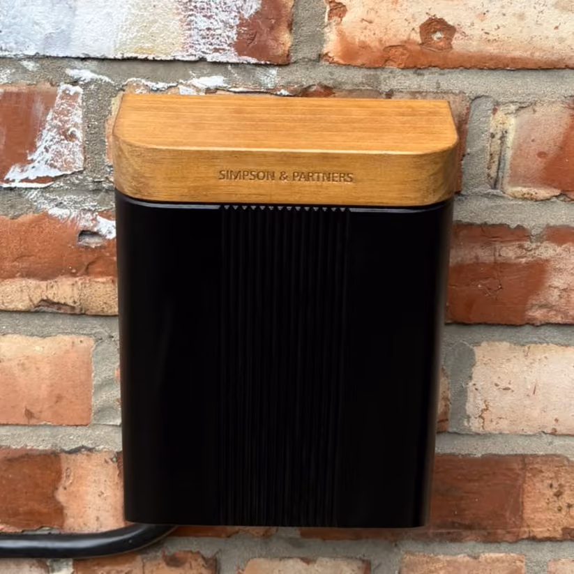 ohme home ev charger installed under light