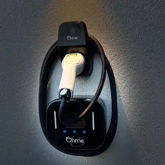 ohme home ev charger installed under light