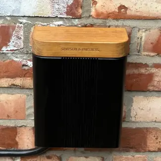 ohme home ev charger installed under light
