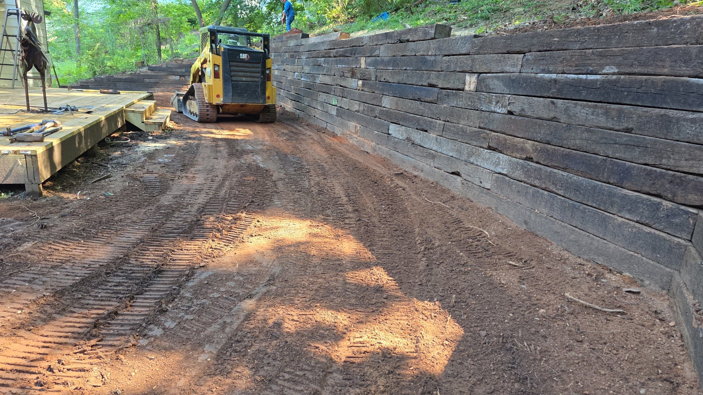 RenoMaxed — repaired retaining wall; interior work remains underway