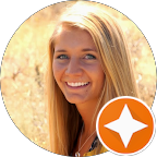 Woman with grassy field background